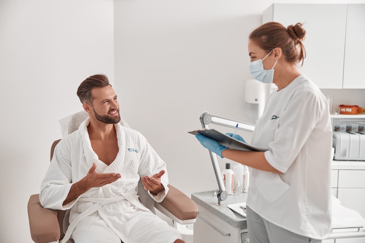 man-talking-with-professional-in-medical-clinic-2026-03-25-05-27-14-utc (1)