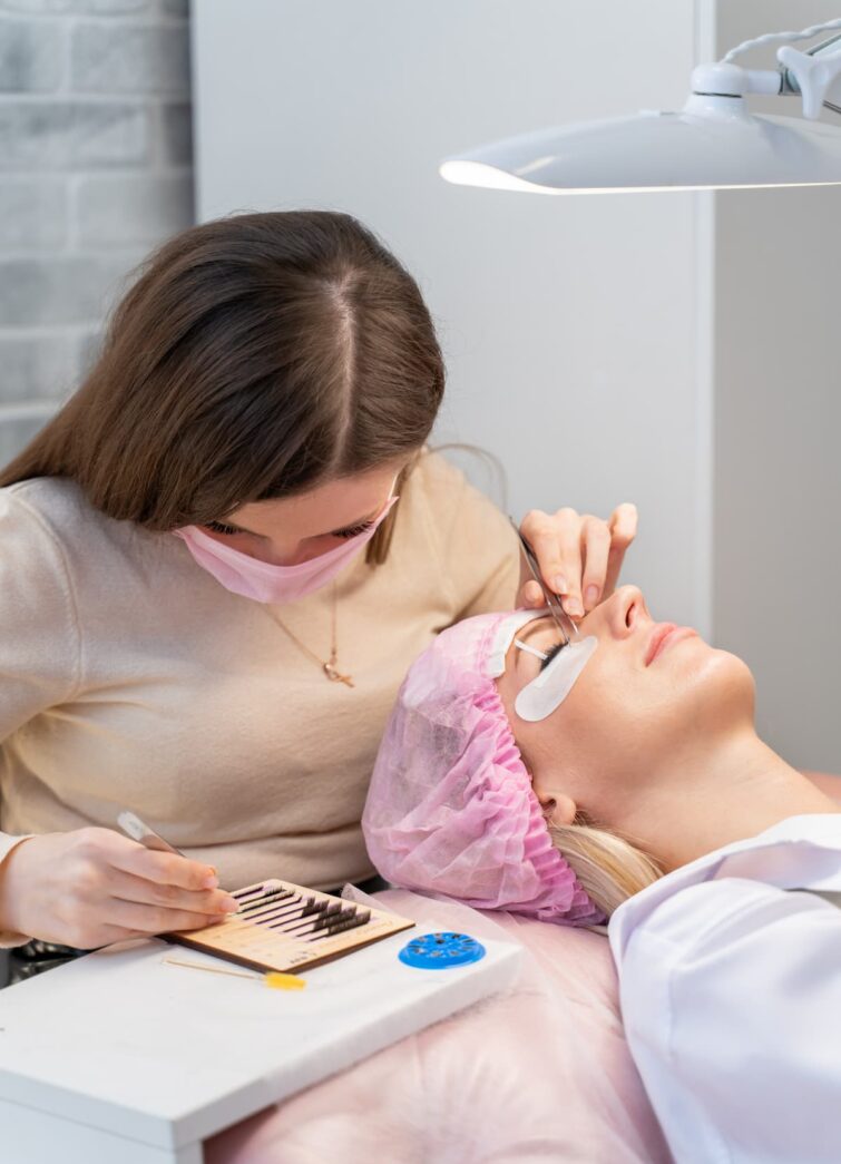 applying-eyelash-extensions-to-a-woman-in-salon-2026-03-20-00-22-40-utc (1)